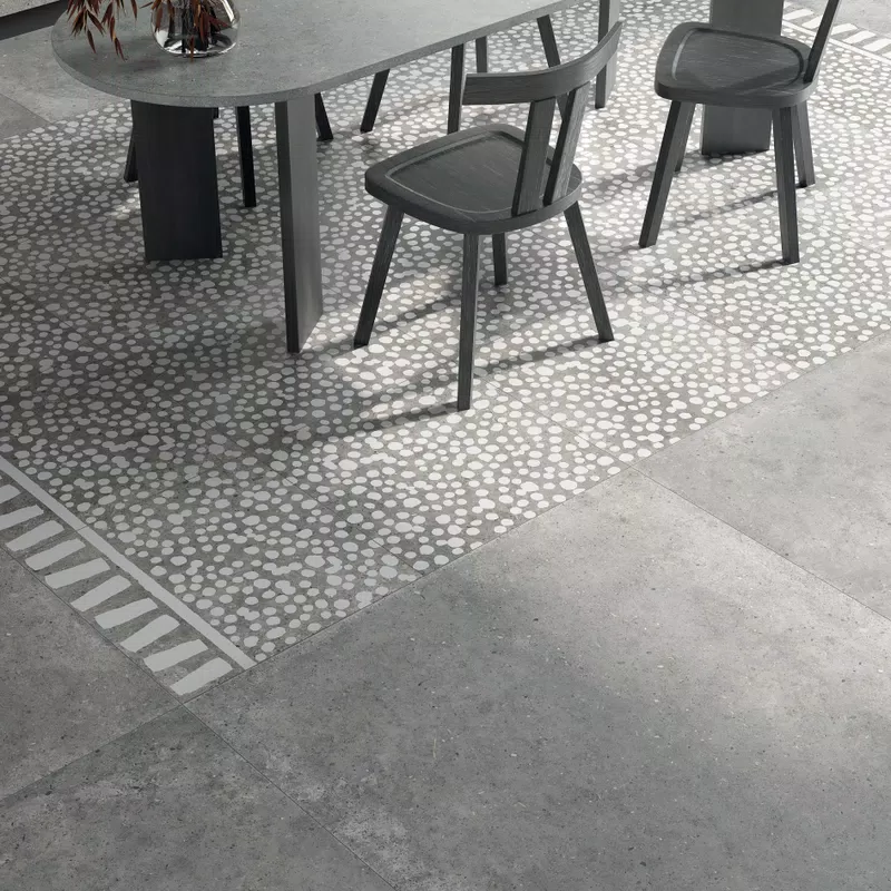 Grey, beige, white tones for the stone-effect tiles of the Poetry Stone collection by ABK.