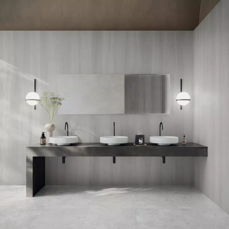 Collection Double par Flaviker : carreaux effet pierre dans les tons blanc, beige, gris.