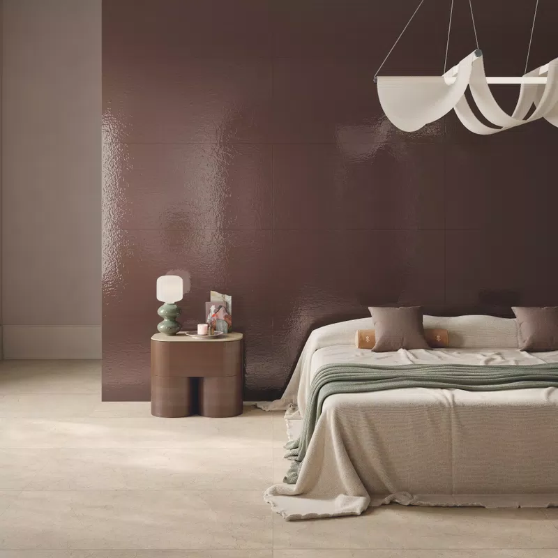 Collezione Glace' di ABK: piastrelle effetto contemporaneo nei toni beige, bianco, marrone.