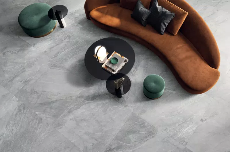 Stone-effect tiles in grey, white, black tones, from the Blue Savoy collection by Flaviker.