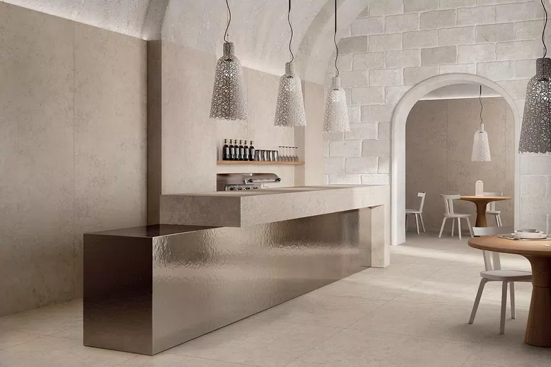 Grey, beige, white tones for the decorative and stone effect tiles of the Poetry Stone Reloaded collection by ABK.